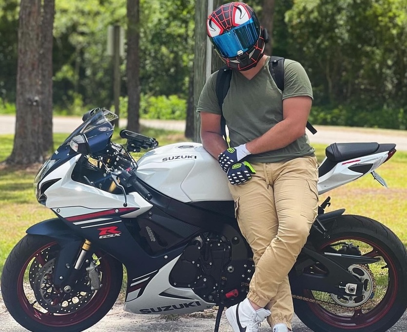 Greg looking cool beside his motorcycle