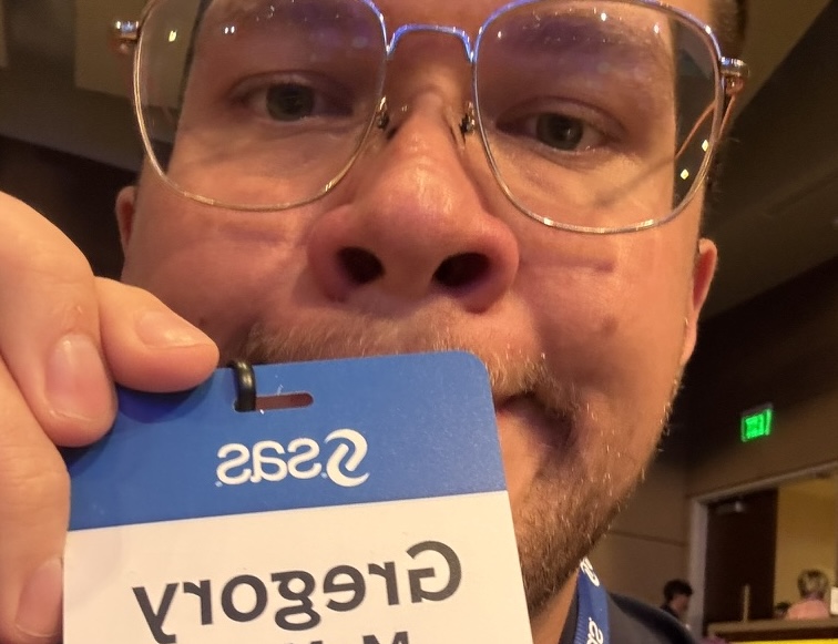 Greg with a SAS visitor badge